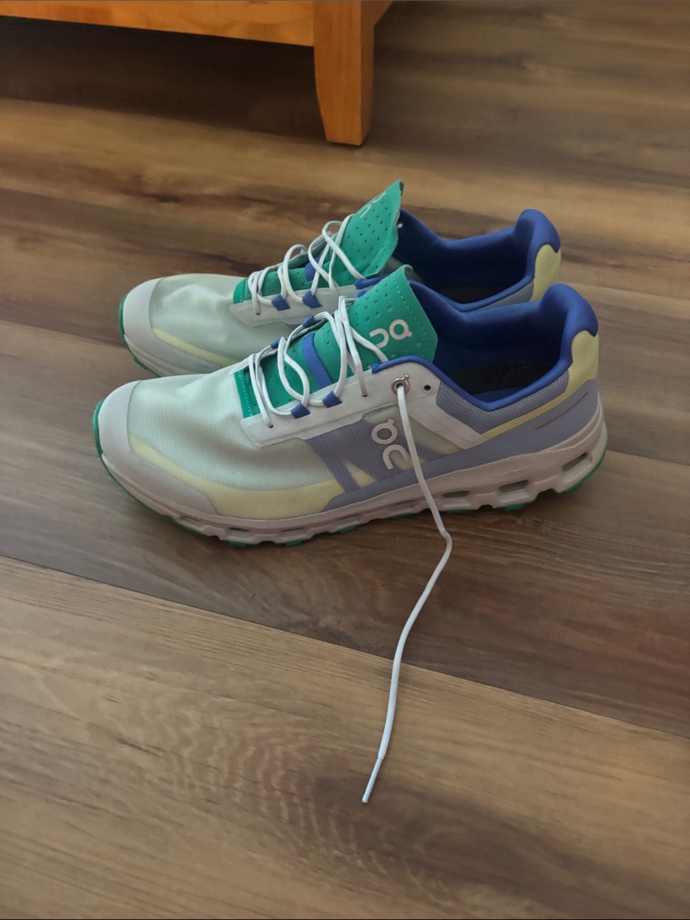 On Running Men Sneakers in Mint, Blue, and Pale Yellow